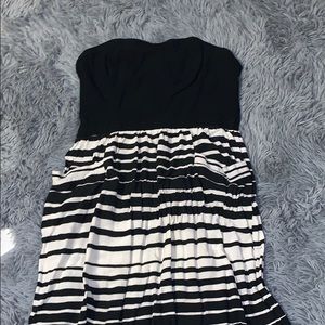 Black and white striped strapless dress.